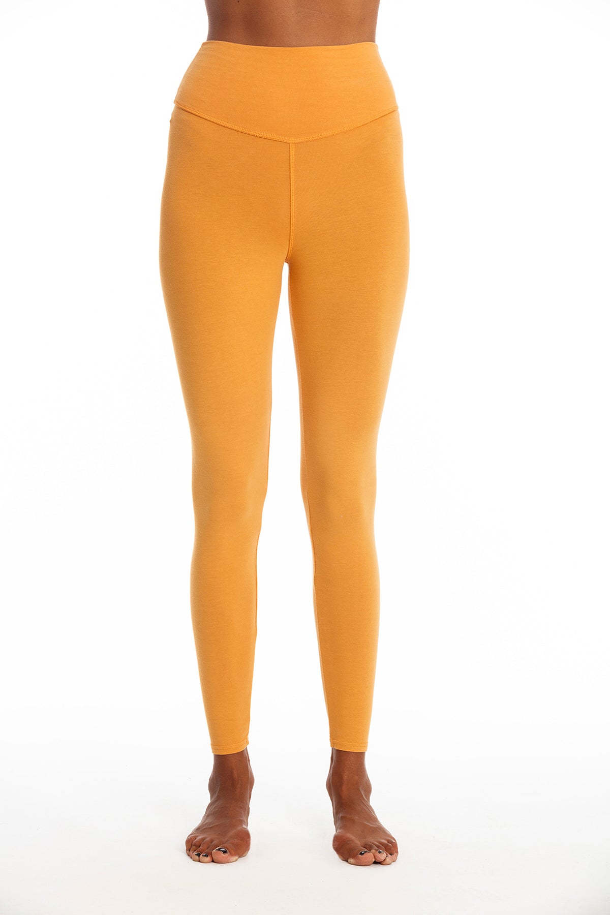 Image of RAVENS VIEW IBIZA dames vegan Yoga Legging Plus Goud Zandgeel