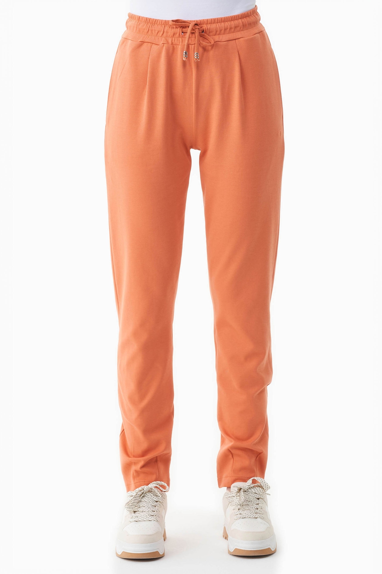 ORGANICATION Damen vegan Sweatpants Lightweight Staubig Orange