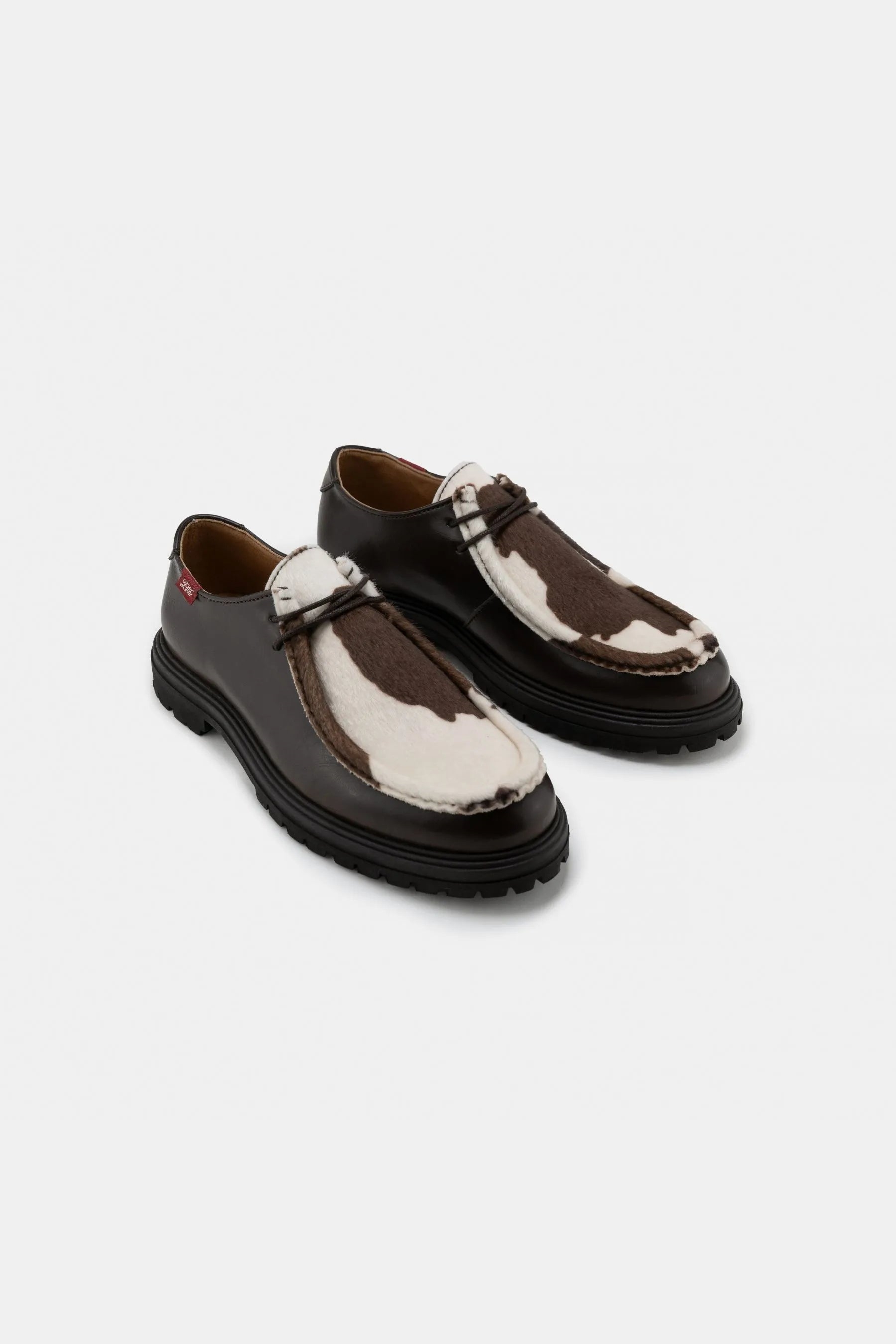 Image of Zèta mannen vegan Schoenen Unisex Soajo Koe Print Bruin/Wit