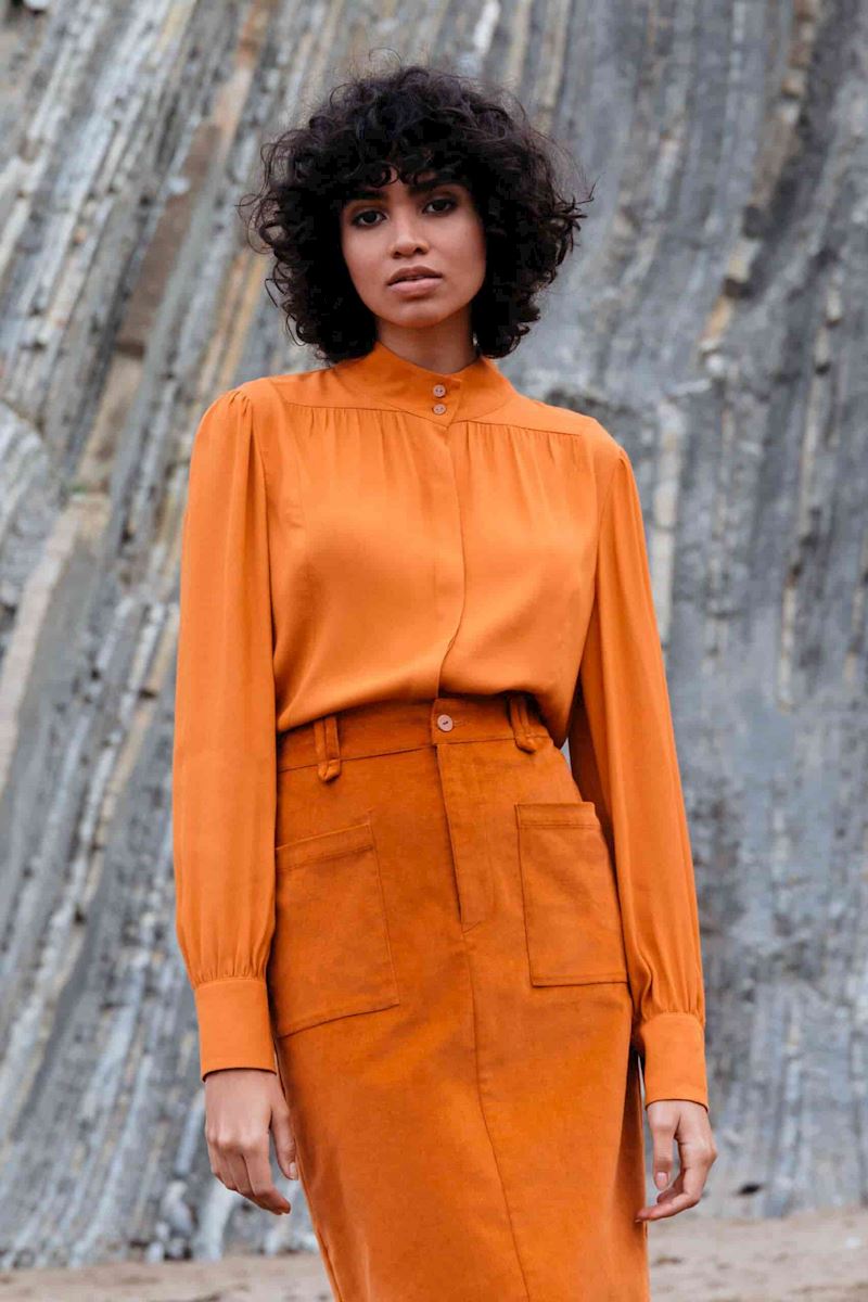 Orange blouse from SKFK made from EcoVero viscose.