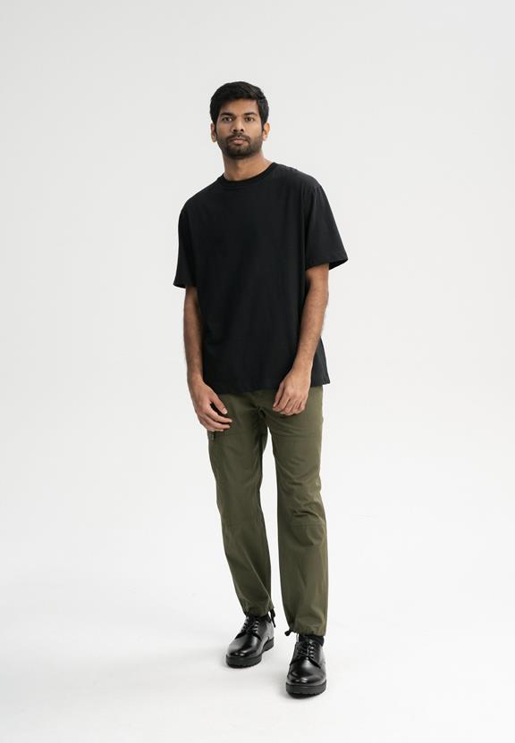 T-Shirt Oversized Zware Bhajan Zwart from Shop Like You Give a Damn