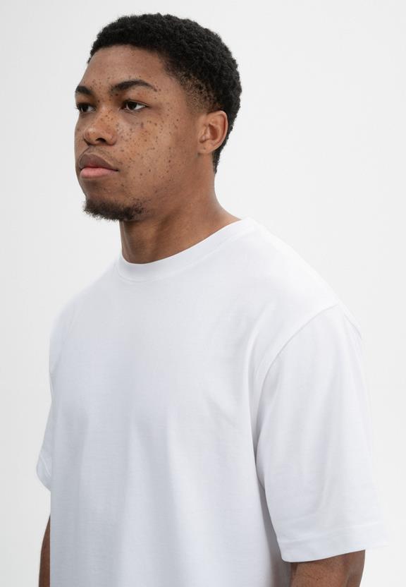 T-Shirt Oversized Zware Bhajan Wit from Shop Like You Give a Damn