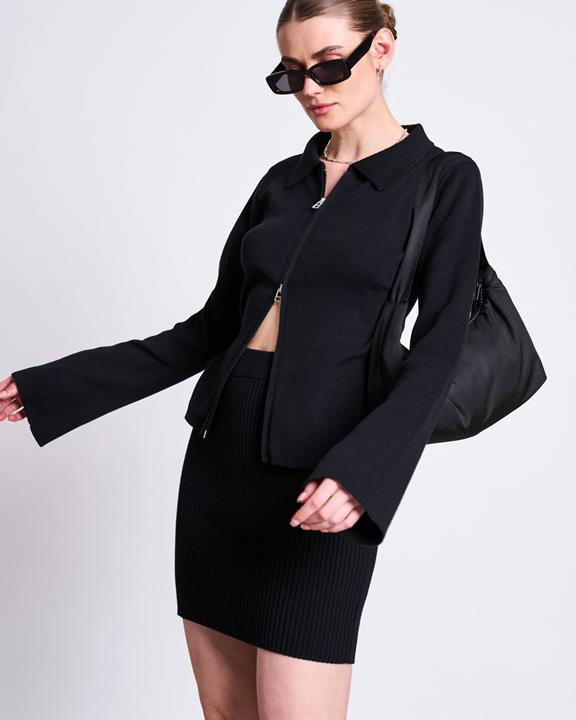 Ritsvest Tyrie Zwart via Shop Like You Give a Damn